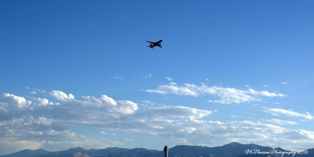 Airplane in the Clouds  #2 7-22-2016.jpg