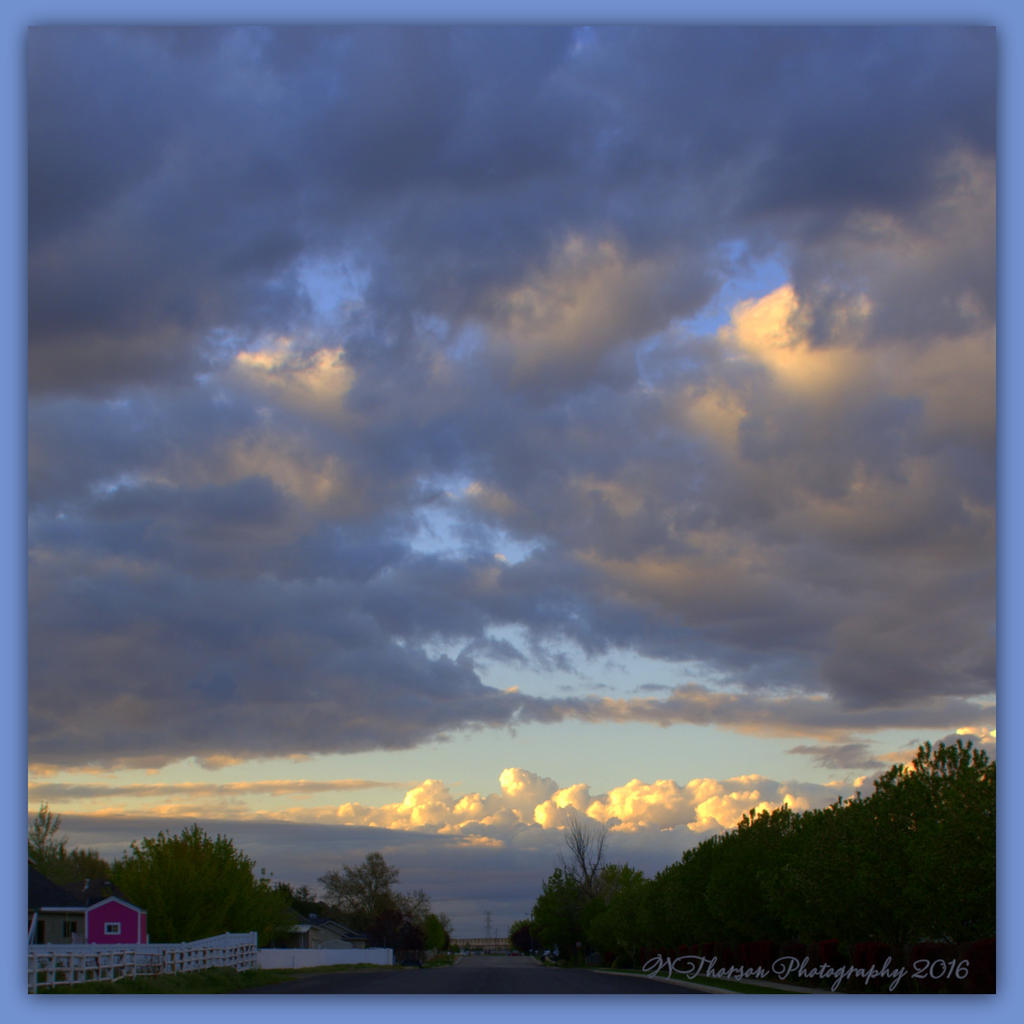 Clouds with a Pink Playhouse  4-26-2016.jpg