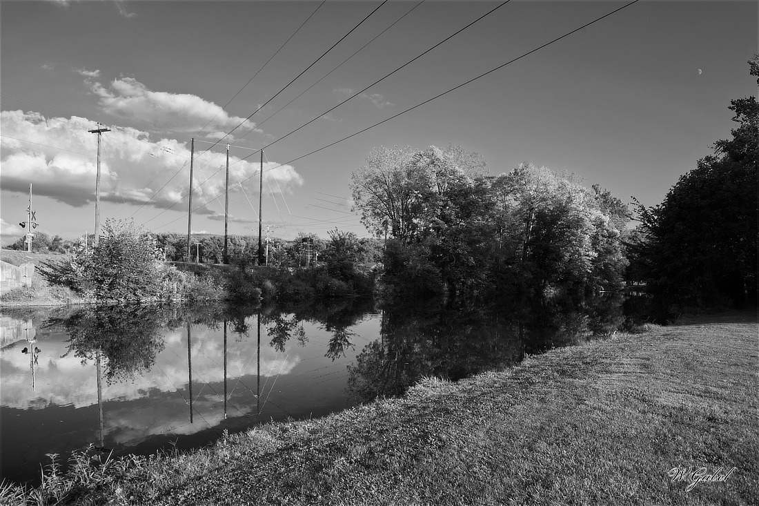 CloudsInTheCreek1729BW sm.jpg