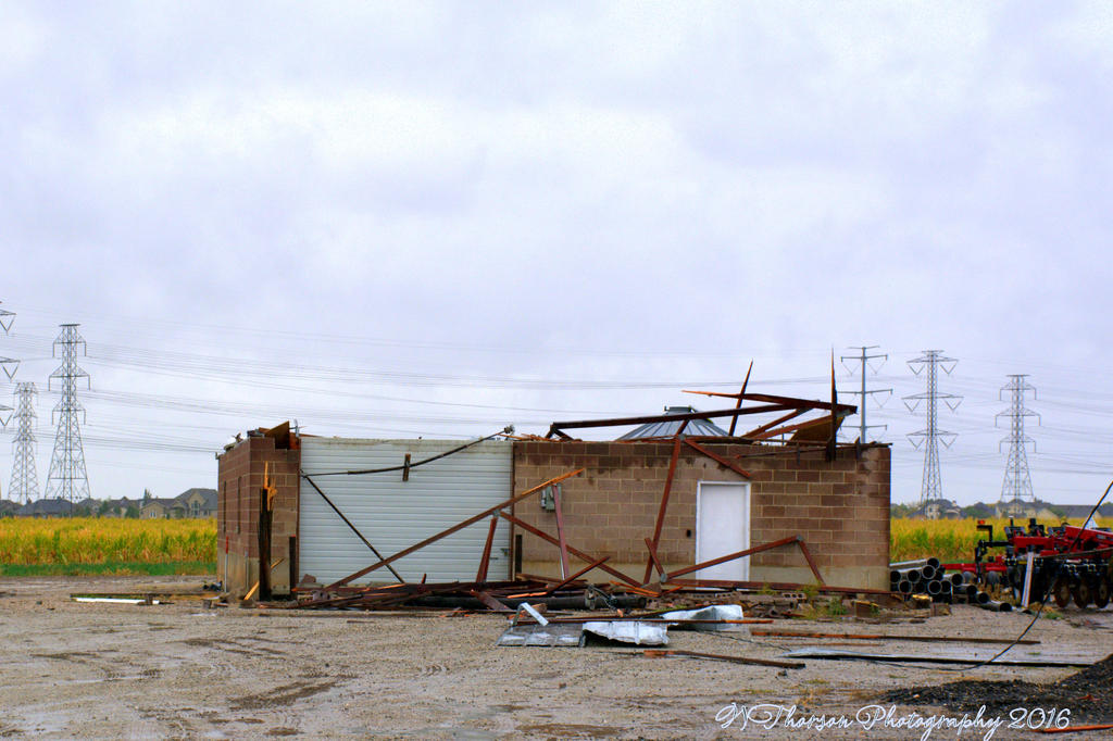 Destroyed Building Roof is Across the Street in a Field 9-23-2016.jpg