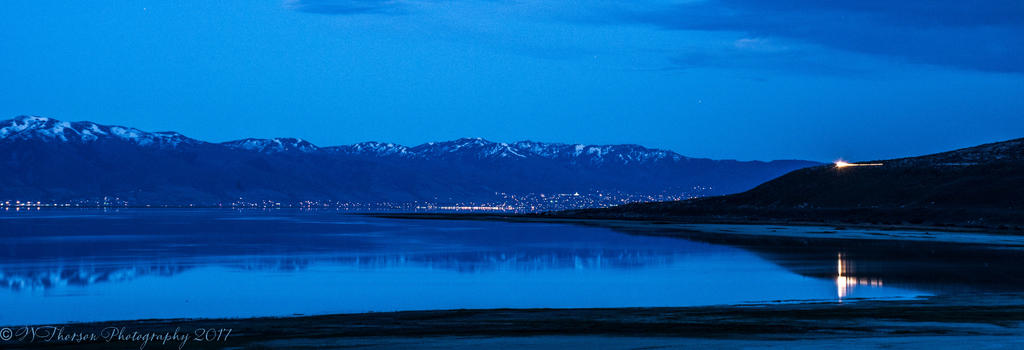 Farmington, Centerville and Bountiful against the Wasatch Mountains at Night across the Great Sa.jpg