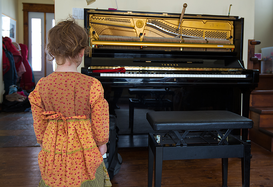 feb21st kid with piano.jpg