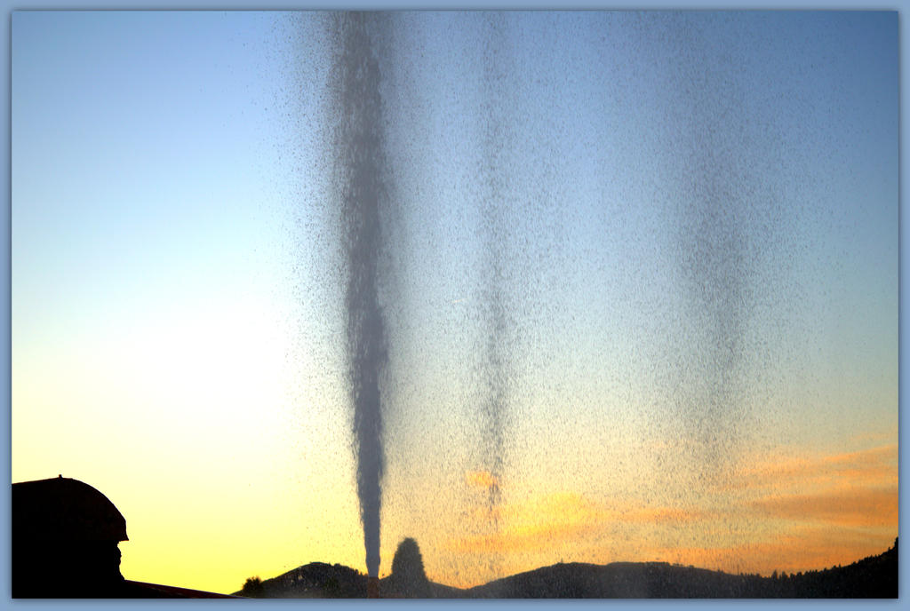 Geyser Erupting at Sunset.jpg