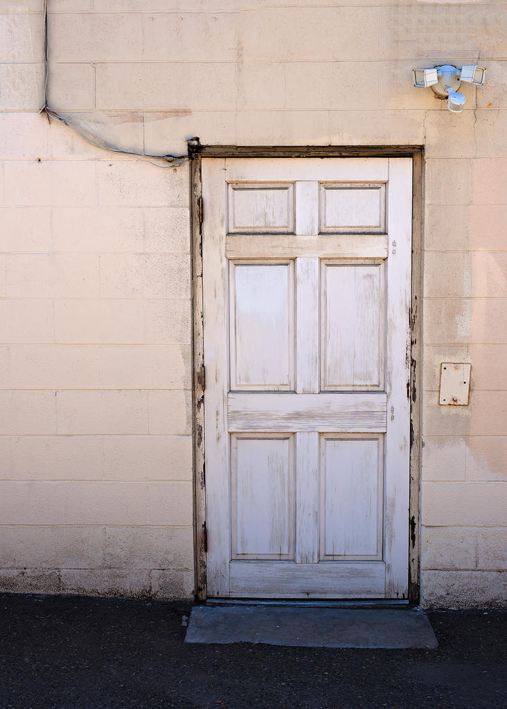 Mysterious White Door With Lamp, Dodgy Wiring, No Door Knob.jpg