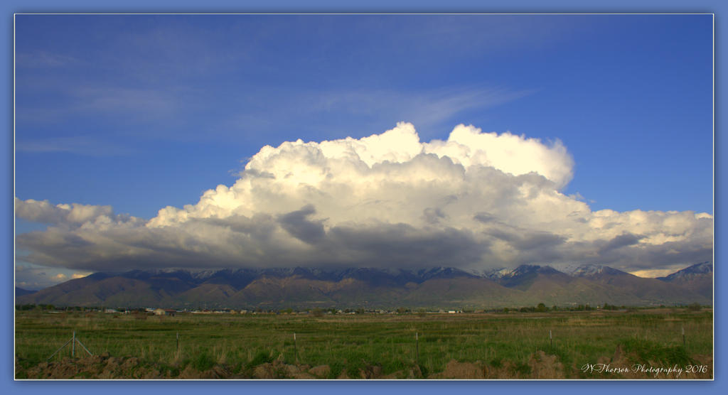 Puffy Clouds at the Snow Line 4-29-2016.jpg