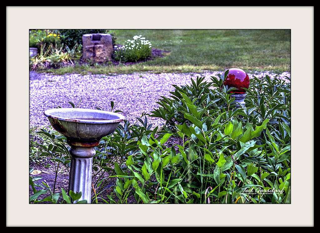 Red Ball Tilted Bird Bath F.jpg