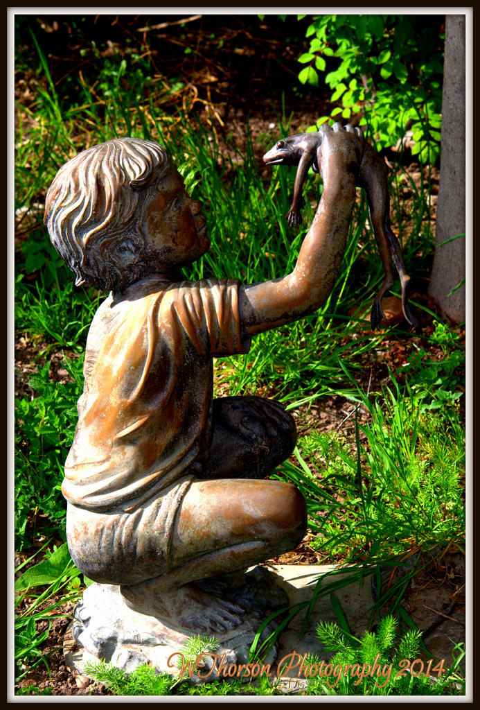 Statue of a boy and a frog.jpg