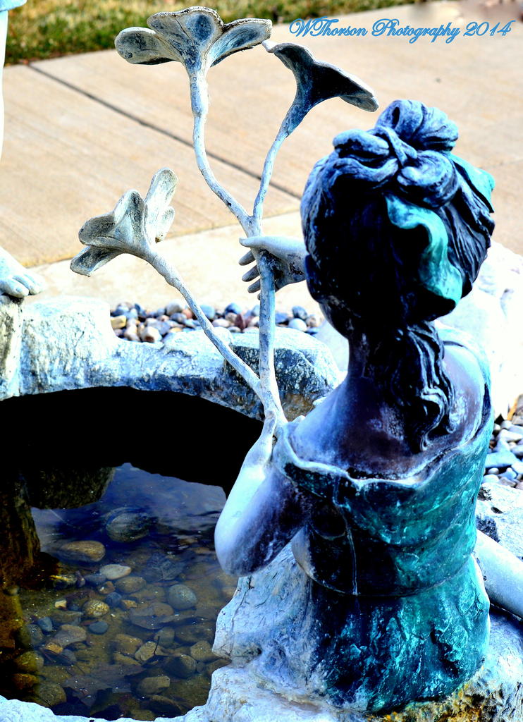 Statue of Girl with Flowers.jpg