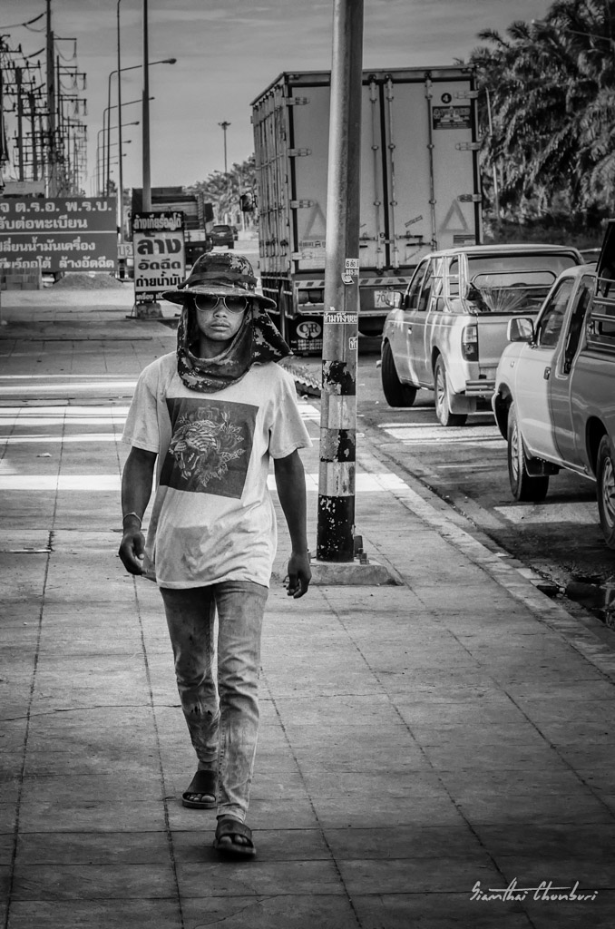 street-man-walking-bw-1.jpg