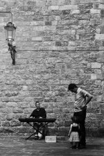 girl watching piano player.jpg
