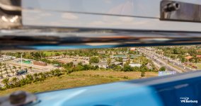 through-a-gap-of-a-big-wheel-gondola-1.jpg