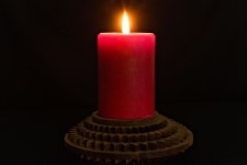 Single Red Candle in the Dark.jpg
